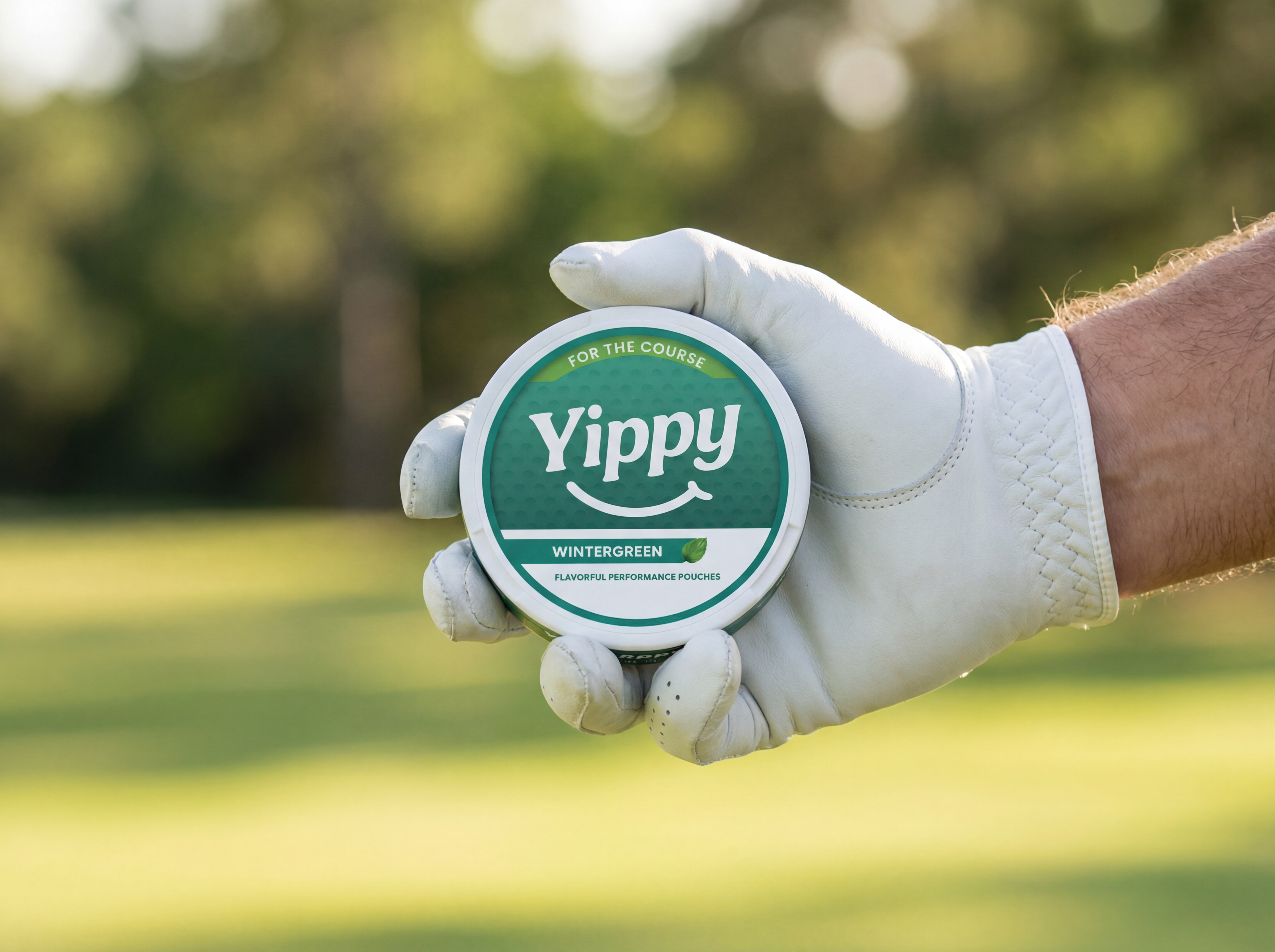 Shop Yippy For The Course Yippy For The Course Wintergreen nicotine-free pouch on a golf course — caffeine-free nootropic pouches for calm focus